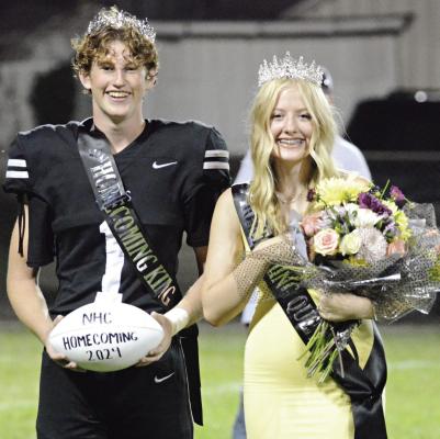 KALEL BOWMAN (left) and Emily Barrett are crowned Hardin-Central Homecoming King and Queen after Norborne Hardin-Central’s 46-20 victory over Orrick at Hardin-Central. Norborne also crowns its king and queen during recent coronation ceremonies. SHAWN RONEY | Staff