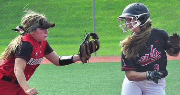 NATALEE WEBER, seen here pursuing a baserunner during a 2019 preseason jamboree at Excelsior Springs, is taking her game to the NCAA Division II level. SHAWN RONEY | Staff