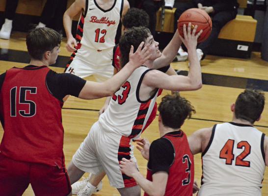 CALEB GANT leans in as he attempts a shot during the first half of Hardin-Central’s Class 1 District Tournament semifinal meeting with Northland Christian Feb. 22 at Norborne. SHAWN RONEY | Staff