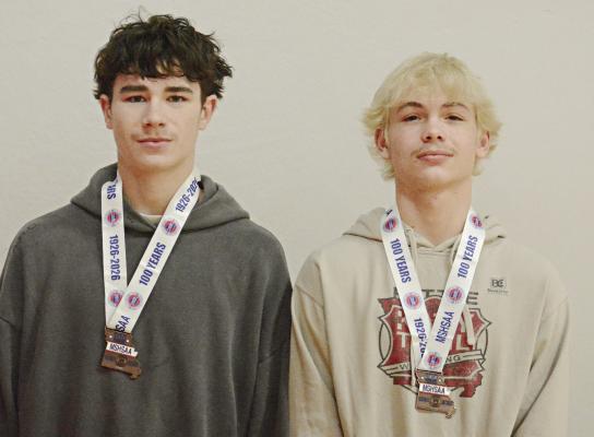 RICHMOND FRESHMAN Ryan Sharp (left) and senior Brady Hyder display their medals from the Class 2 state boys wrestling tournament. SHAWN RONEY | Staff