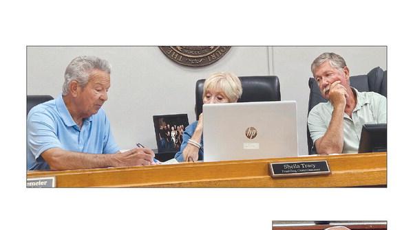 RAY COUNTY COMMISSIONERS Max Hockemeier (from left), Sheila Tracy and Bobby Don Davis discuss ongoing bridge projects as work continues at several locations throughout the county. MIRANDA JAMISON | Staff