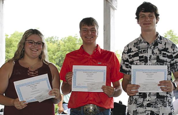 CARSEY CALVERT (from left), Cash Honeycutt and Will Robinson are honored with the Harold Strobel “Citizen of Service” Award. Submitted