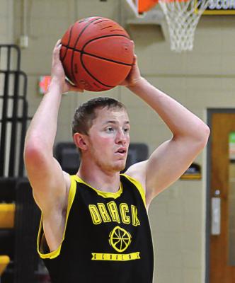 SENIOR BLAKE BUCHANAN looks to pass during a November practice. SHAWN RONEY | Staff