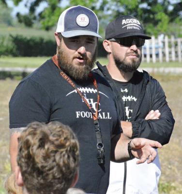 WITH HIS WHISTLE resting against his T-shirt, Norborne Hardin-Central varsity 8-man football coach Andrew Watson addresses his players and staff after their June 6 team camp session at Hardin-Central. SHAWN RONEY | Staff