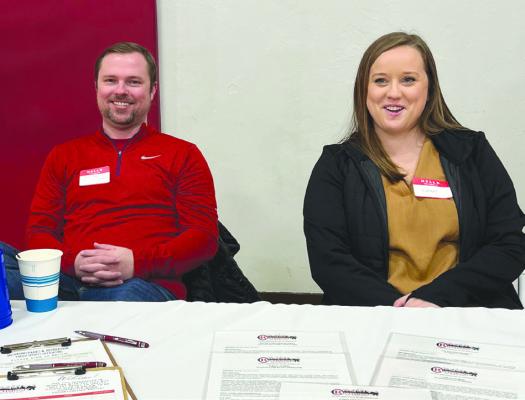 RICHMOND CITY STAFFERS Economic Director James Gorham and Human Resources Director Courtney Williams welcome community members and answer questions. SOPHIA BALES | Staff