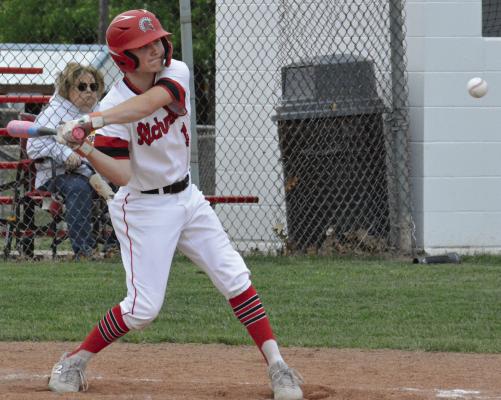 AT TIMES, some intense “arguing” with a camera is required to make it functional enough to capture the drama of high school baseball and other sports. SHAWN RONEY | Staff