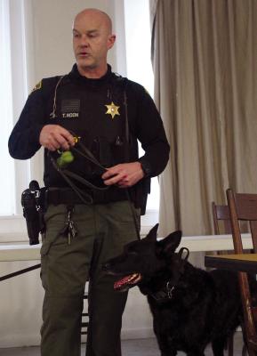 LT. COL. TOM NOON discusses sheriff’s office operations during a public forum in Camden while working alongside canine Rowdy. MIRANDA JAMISON | Staff