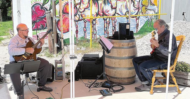 ALAN VOSS AND FORREST STEWART play jazz music for Of The Earth Farm Distillery’s Sunday Soiree. SOPHIA BALES | Staff