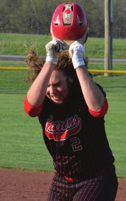 YIPEE! Richmond junior Jack Gogue flips his batting helmet to the dirt in jubilation Tuesday at Southview Park after providing the game-winning hit in Richmond’s 3-2 comeback victory over Lafayette County of Higginsville. SHAWN RONEY | Staff