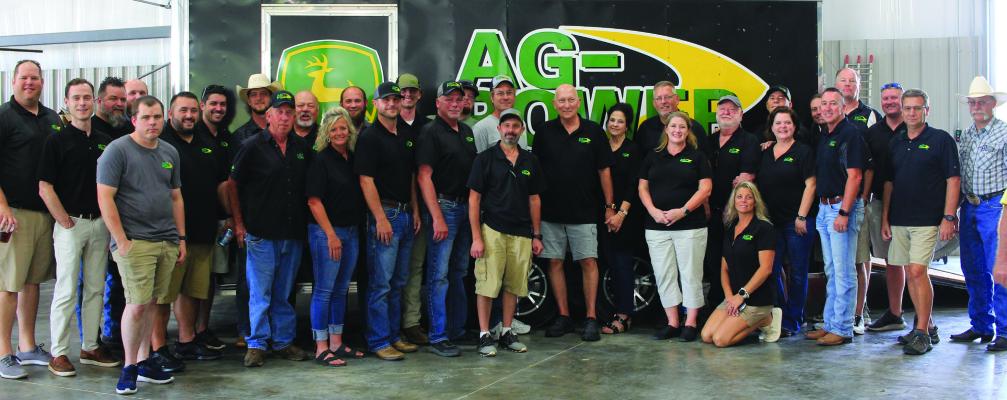 Ag-Power’s staff gather to show off their new facility and to celebrate its grand opening Aug. 26. The evening includes live music, food and drink, drawing guests from across several counties. SOPHIA BALES | Staff