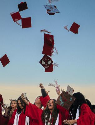 MEMBERS OF THE Richmond High School Class of 2026 toss their caps into the air, marking the end of their graduation ceremony and the beginning of a new chapter in life. SHARON DONAT | Staff