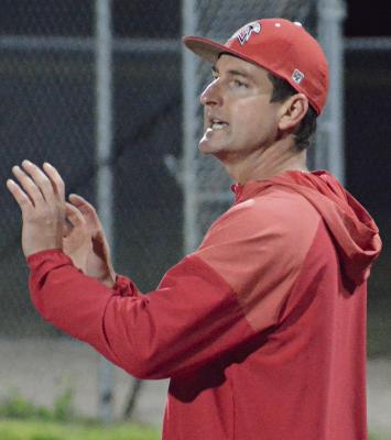 RICHMOND VARSITY SOFTBALL COACH Trent Thompson, shown giving instructions during a recent team practice at Southview Park, wants his Spartans to have fun, improve and be competitive this season. SHAWN RONEY | Staff