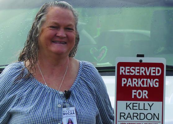 COWORKERS HONOR Kelly Rardon with a reserved parking sign after decades of dedication to the Richmond Head Start Center and the families it serves. SHARON DONAT | Staff