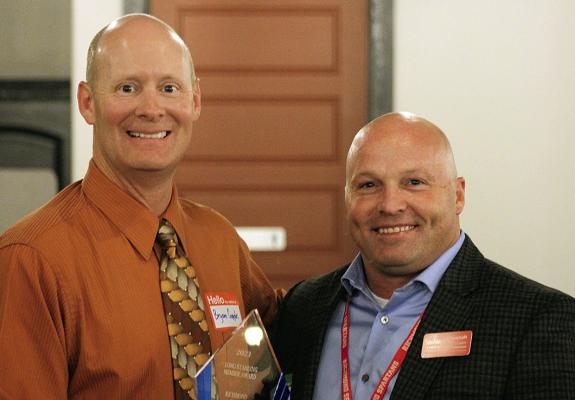 RICHMOND R-XVI School District Superintendent Dr. Bryan Copple (left) and Assistant Superintendent Dr. Trey Cavanah accept the school’s chamber award. SHARON DONAT | Staff