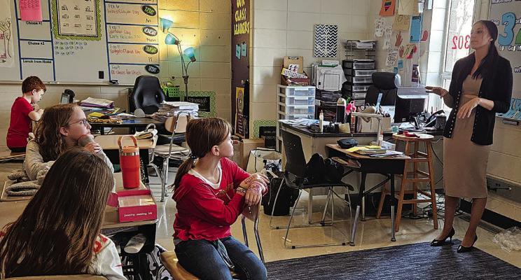 EXCELSIOR SPRINGS Standard reporter Miranda Jamison presents a guide to interviewing for Kearney Newspaper Club last week. CHELSEA MILLER | Submitted