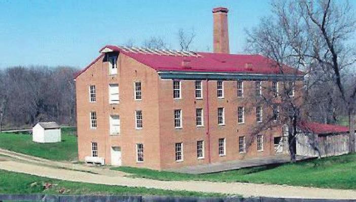 BUILT IN 1860, a year before the start of the Civil War, steam-powered Watkins Mill still contains early textile milling equipment. The park offers several additional buildings, including an eight-sided schoolhouse and a church.