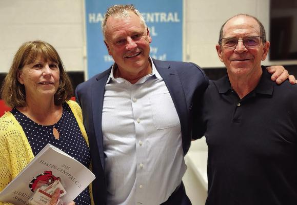 KATHY (FROM LEFT) and Coach Gary O’Neal share memories of Hardin-Central with Billy Warren. Submitted