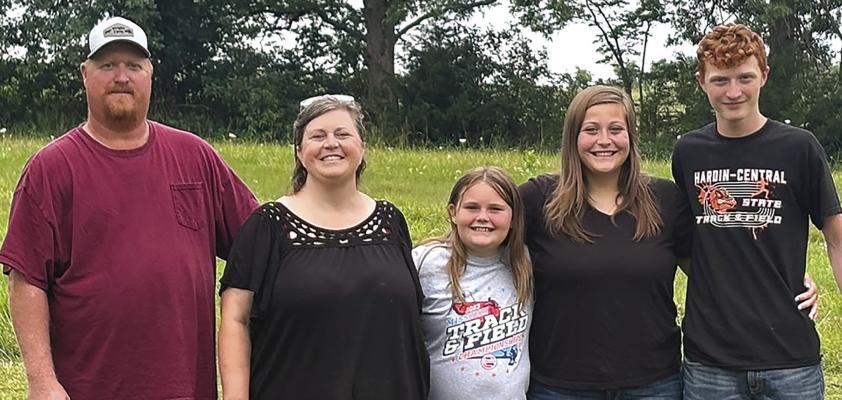Jeremy McGinnis (from left), his wife Jamie McGinnis, daughter Amaryllis, daughter Kassie, and son Kaden are this year’s recipients of the Ray County Farm family. JOSHUA BRUNGARDT | Staff
