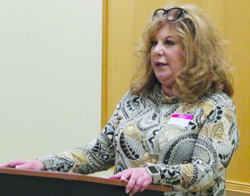 NATALIE MACEY, owner of Macey Bail Bonds, shares her story about becoming a business owner and encourages all attendees to treat others with kindness. MIRANDA JAMISON | Staff
