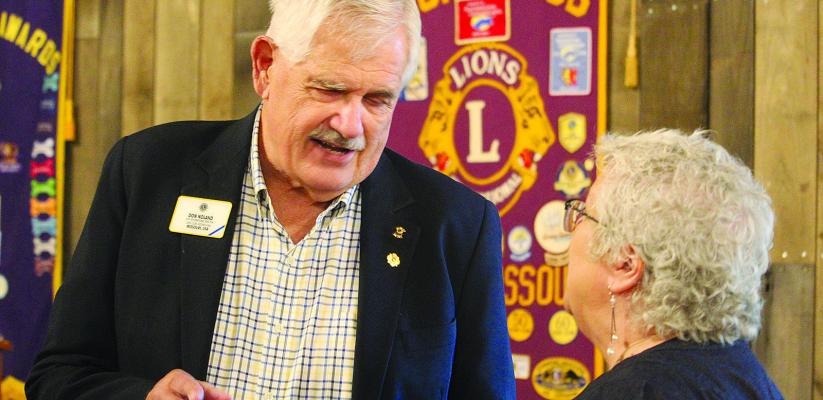 PREVIOUS LIONS CLUB International Director Don Noland (left) visits with other club members from across the state during the 75th anniversary celebration. MIRANDA JAMISON | Staff