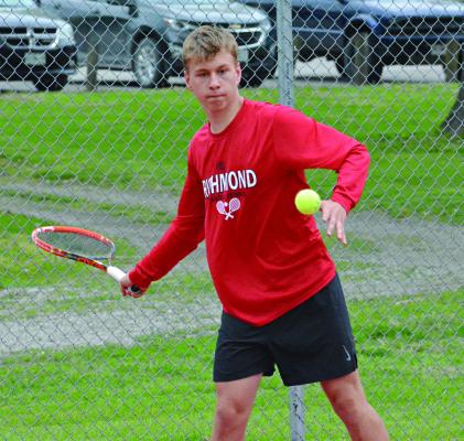 FELIX DE HESSELLE waits to hit a forehand shot during Richmond’s April 27 Missouri River Valley Conference East Division dual with Carrollton at Maurice Roberts Park. SHAWN RONEY | Staff