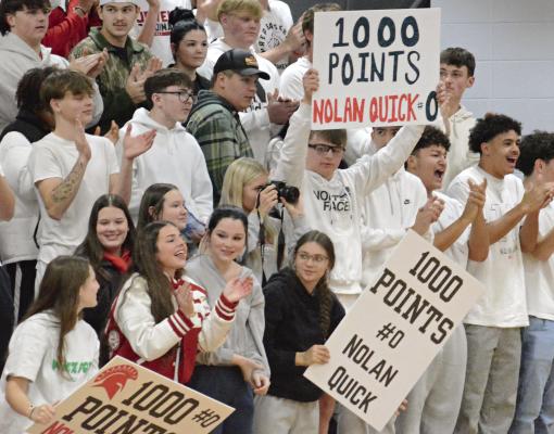 RICHMOND’S STUDENT SECTION cheers when senior Nolan Quick scores his 1,000th career point in varsity basketball, achieved during the first half of the Spartans’ meeting with Winnetonka. SHAWN RONEY | Staff