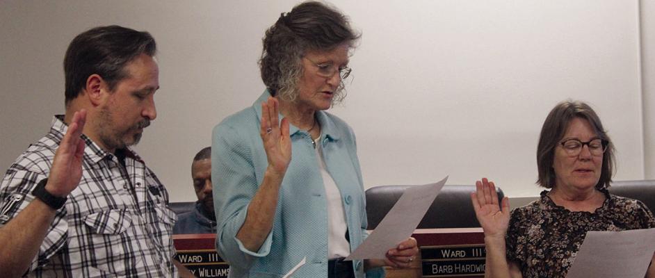 ROB BRASH (from left), Barb Hardwick and June Paige begin their terms on the Richmond City Council after being sworn in. SHARON DONAT | Staff
