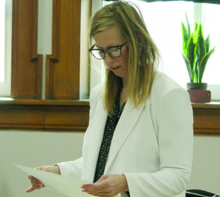 RAY COUNTY PROSECUTING Attorney Camille Johnston explains discovery requirements and dismissed case figures while presenting information to commissioners. MIRANDA JAMISON | Staff
