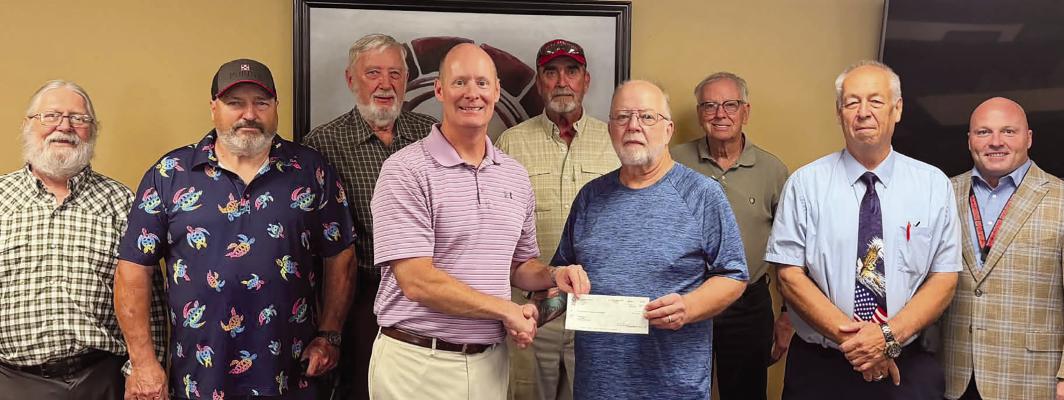 A $1,500 DONATION was made to the Richmond R-XVI School District’s Backpack and Meal Assistance Program from Ray Lodge No. 223 in Camden. The donation will help provide meals and food assistance to qualifying students. Shown above are Charlie Baker (from left), Tom Doss, Mac Proffitt, Richmond R-XVI Superintendent Dr. Bryan Copple, Mike Clubine, John Rinkenbaugh, Keith Proffitt, Bill French and Richmond R-XVI Assistant Superintendent Dr. Trey Cavanah. Submitted