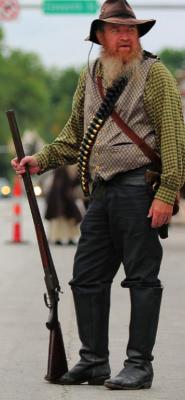 SHOTGUN in hand, Lester Williamson, Odessa, hunts outlaws. Reenactors know history, including what really happens during the Lexington bank robbery and when the military guns down Archie Clement. J.C. VENTIMIGLIA | Staff