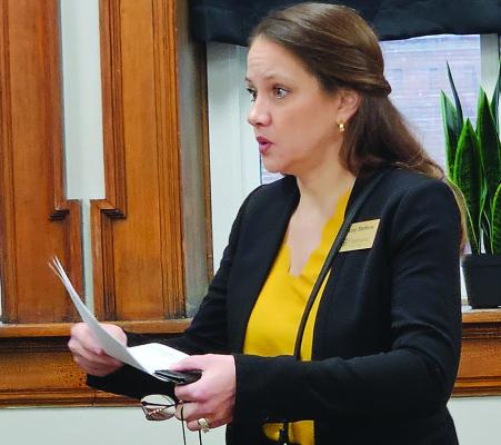 MU EXTENSION REGIONAL DIRECTOR Stacey Steffens presents budget materials while discussing MU Extension services with county officials. MIRANDA JAMISON | Staff