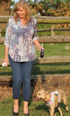 Local resident Rhonda Kinnison takes the opportunity to bring her dogs to the Annual Pet Clinic hosted by the City of Richmond and Renfro Veterinary Services. SOPHIA BALES | Staff