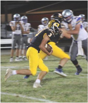 CALLED ON to do the lion’s share of the running after Jaxon Miller suffers a minor hamstring pull, Orrick senior Zander Stevinson carries the football during the Bearcats’ Sept. 30 homecoming victory. SOPHIA BALES | Staff