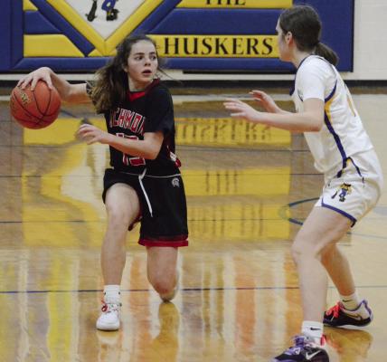 GENEVIEVE DIDIER (left), shown in December 2022, looks to be a team manager in multiple sports this school year while she rehabs from an injury. SHAWN RONEY | Staff