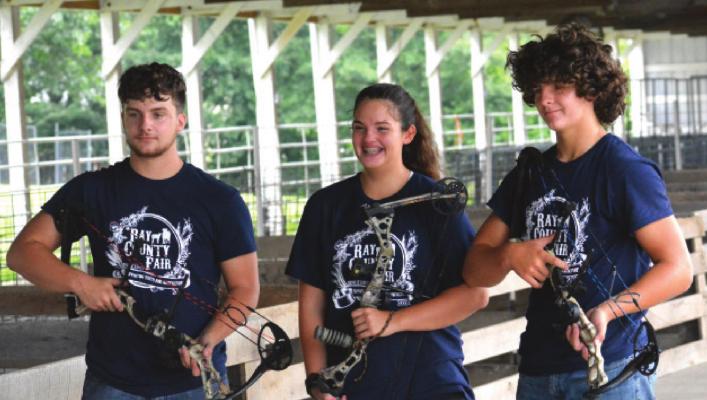 FROM LEFT are archers, and siblings, Blake, Paige and Trent Logsdon. SHAWN RONEY | Staff