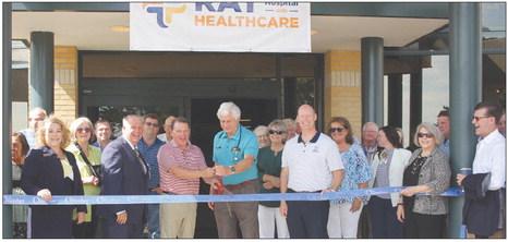 The Richmond community show’s support as Representative Sam Graves (left) and Dr. Mark Rose cut the chamber ribbon. SOPHIA BALES | Staff