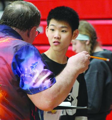 AIDEN YAN works through spending decisions during Richmond Middle School’s first-ever Reality Fair. SHARON DONAT | Staff