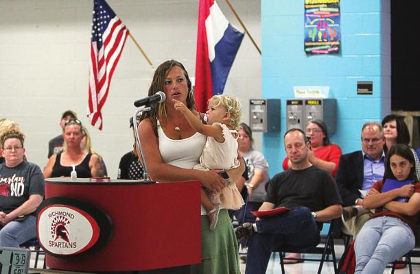 Corie Stevens, mother of four, said masks and school exercise do not mix and then referred to the audience of about 70 mostly maskless people, saying, “It speaks volumes whenever you have 90% of people showing up without masks on.” J.C. VENTIMIGLIA | Staff