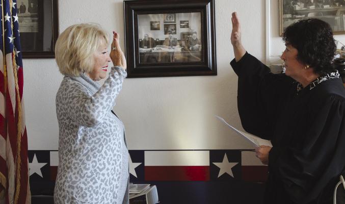 GOVERNOR APPOINTED Presiding Ray County commissioner Sheila Tracy (left) is sworn in by Eighth Judicial Circuit Court Judge Lori J. Baskins. SHARON DONAT | Staff