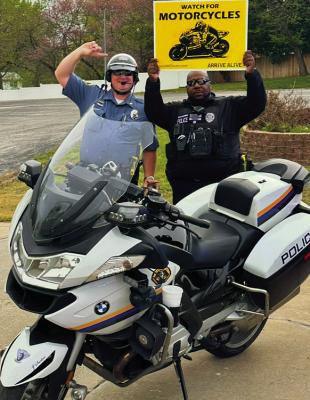 LOCAL LAW ENFORCEMENT officers promote motorcycle safety awareness as riding season begins. Submitted