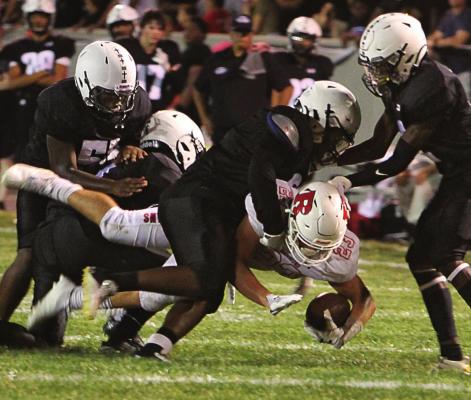 ASSISTING on Richmond’s seventh TD drive, running back Aidan Ivison dives for a couple of extra yards. Earlier in the game, Ivison catches a TD pass and grabs a scoop-and-score fumble for another touchdown. J.C. VENTIMIGLIA | Staff