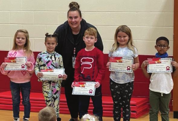DEAR RESPONSIBILITY STUDENTS for kindergarten, from left, are Jocie Williams, Gracie Hicks, Mrs. Spratt, Owen Johnson, Heather Hayes and Avondre Jackson.