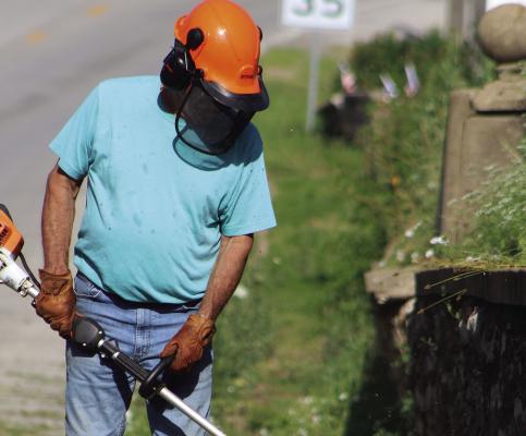 Commissioners participate in cemetery cleanup day