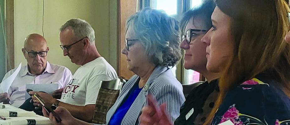 TERRY THOMPSON (from left), Doug Richey, Peggy McGaugh, Doreen Hasebeck and other participants listen to issues during the presentation. SHARON DONAT | Staff