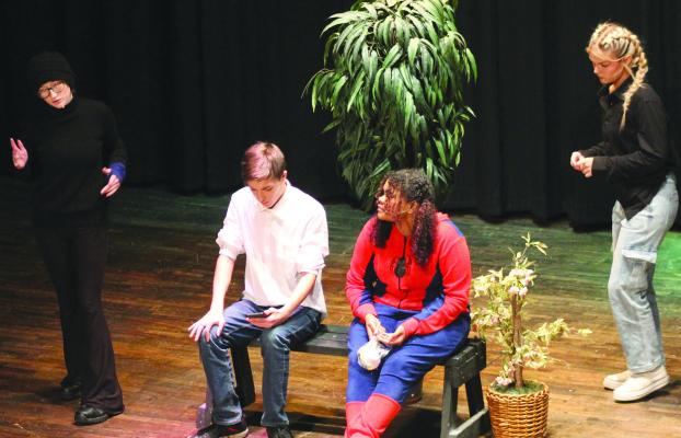 RICHMOND HIGH School actors Serenity Taylor (from left) as Bonnie, Timothy Vaughn as a father, Kara Clayton as a child and Alaina England as Claudine in the Farris Theater last weekend. SOPHIA BALES | Staff