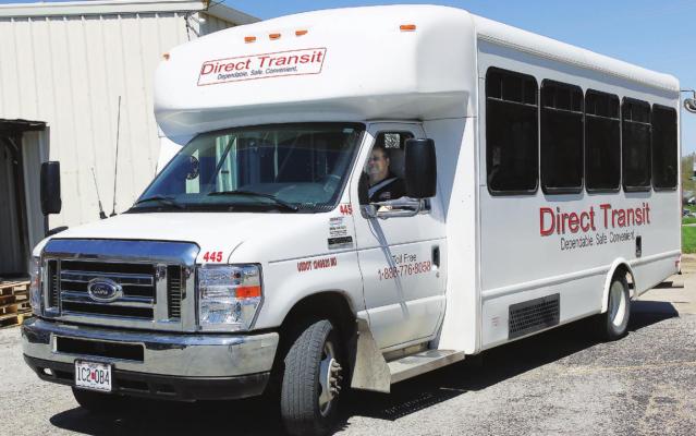 HALF-A-DOZEN people in the Direct Transit bus driven by Sid Lewis are in line for food at the Salvation Army Family Store in Richmond. J.C. VENTIMIGLIA | Staff