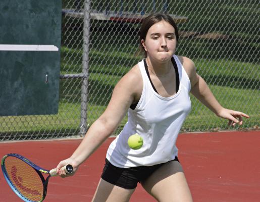 RICHMOND JUNIOR Raegan Alderson keeps her eyes on the ball as she works on her baseline return shots Aug. 10 at Maurice Roberts Park. SHAWN RONEY | Staff