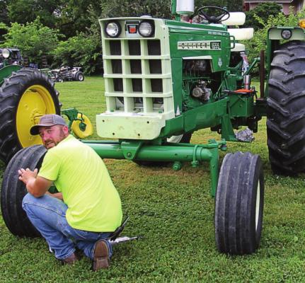 TRACTOR SHOWS are popular in ag areas, and Brandon Lamb shows off his during the Hardin Sesquicentennial.