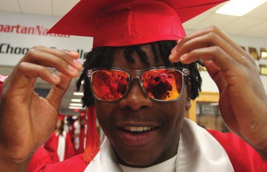 READY for the sun outside, Jacoby Johnson puts on his shades inside the school.