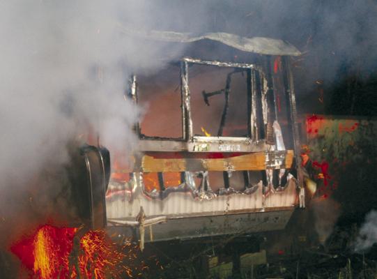 MIRANDA JAMISON | Staff THIS TRAILER was fully engulfed in flames upon arrival of firefighters on the scene.